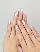 Hand model wearing Naillover Tender Shine cat eye Singapore press on nails with pearlescent finish